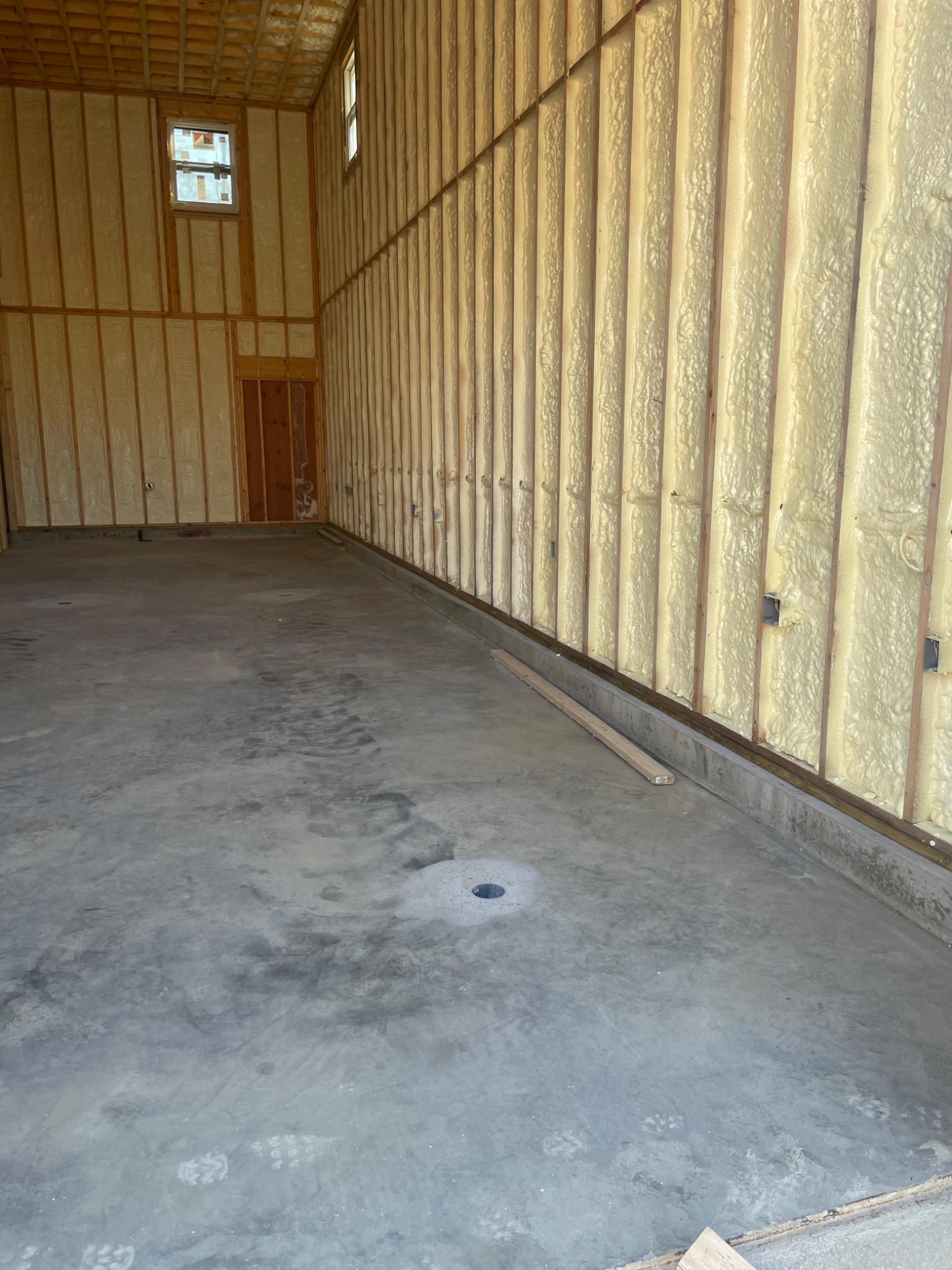 Spray foam insulated wall on site